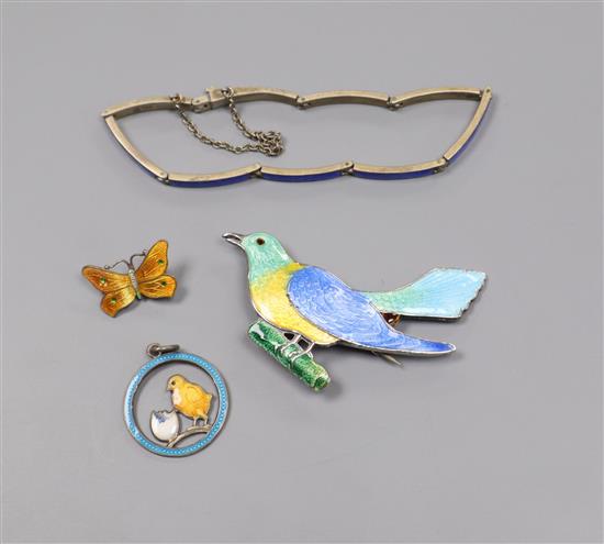 Four items of silver/white metal and enamel jewellery including pendant, bracelet and two brooches.